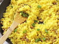 Shake up your side dish routine with this flavorful turmeric cauliflower rice! Simple, healthy and low in carbs, it’s a great make-ahead recipe!