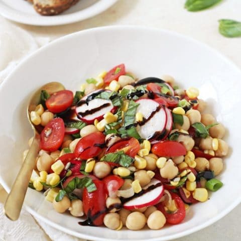 Just 15 minutes to this easy, healthy and fresh garden veggie balsamic chickpea salad! With fresh veggies, herbs and a honey balsamic dressing!