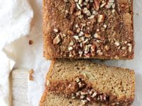Delightfully soft and moist apple snickerdoodle bread! Made with whole wheat flour, applesauce, yogurt and grated apple! Finished with a cinnamon sugar topping!