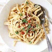 Dreamy, creamy whole wheat pumpkin fettuccine! Just 30 minutes to this healthier fall spin on classic alfredo! Dairy free, vegan and delicious!