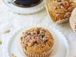 Soft and fluffy harvest sweet potato muffins! These simple muffins are filled with sweet potato puree, maple syrup, whole wheat flour and a crumb topping!