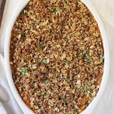 This savory sweet potato casserole is perfect for the holidays! Healthy & delicious! With a creamy potato base and a crispy oat & nut topping!