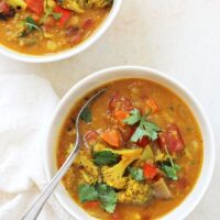 This easy turmeric quinoa vegetable soup is super comforting and cozy! Filled with flavorful spices, colorful veggies, chickpeas and coconut milk!