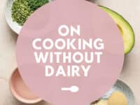 Ingredients on a surface with On Cooking Without Dairy text overlay.