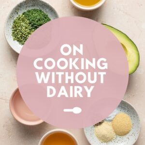 Ingredients on a surface with On Cooking Without Dairy text overlay.