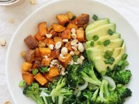 Super simple peanut chickpea sweet potato bowls! This easy meal is packed with roasted sweet potatoes, broccoli, bok choy and peanut sauce! So flavorful and filling!