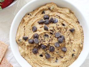 Just 10 minutes and a few simple pantry staples to this peanut butter cookie dough dessert hummus! This healthier dessert is easy to make and completely addicting! Vegan & gluten free!
