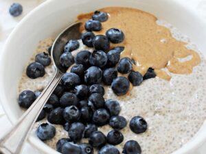 Super easy and healthy blueberry almond butter chia pudding! With dreamy vanilla and almond butter blended right into the base, this pudding can’t be beat! Vegan & gluten free!