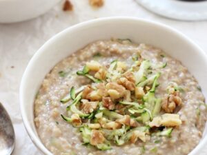 Perfectly creamy zucchini bread steel cut oatmeal! This healthy breakfast is filled with rich vanilla, warm cinnamon and shredded zucchini! Vegan and gluten free!