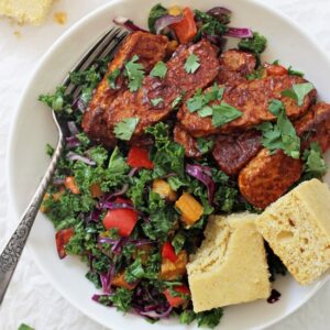 Finger licking good baked BBQ tempeh bowls! This healthy dinner is packed with BBQ tempeh, roasted veggies, tender kale and a creamy dressing! Vegan & gluten free!