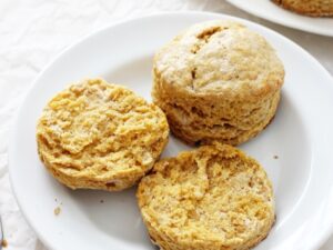 Soft and tender vegan sweet potato biscuits! With a slightly crisp exterior, these simple savory biscuits are hard to resist! Made with coconut oil, coconut milk and sweet potato puree! Excellent for thanksgiving or a regular day. And dairy free!