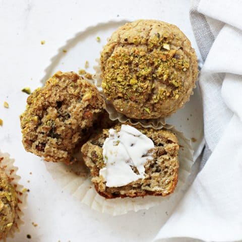 Healthier pistachio muffins! Easy and simple to make, this homemade version is so much better than the kind from the store! Moist, fluffy and packed with wholesome ingredients like whole wheat flour, greek yogurt and honey! Excellent for snacking!
