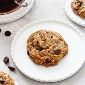 Perfectly soft and chewy coconut oil oatmeal cookies! Super easy to make and no mixer required! Packed with rolled oats and dark chocolate chips, these dairy free cookies are excellent for any day of the week!