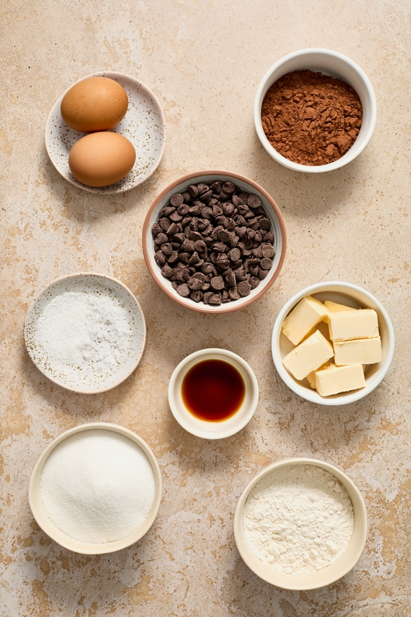 Ingredients for brownies in small bowls.