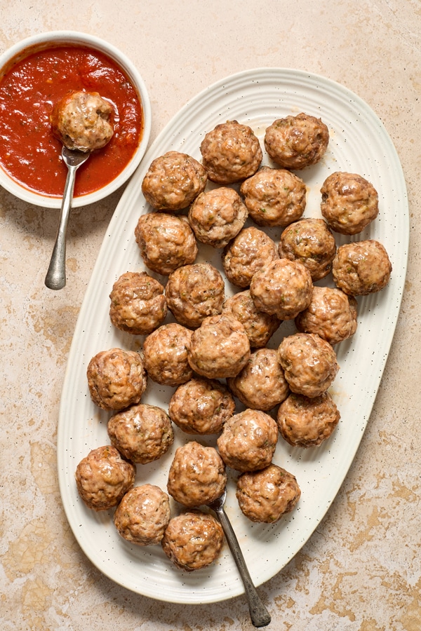 A white platter filled with Gluten Free Dairy Free Meatballs.