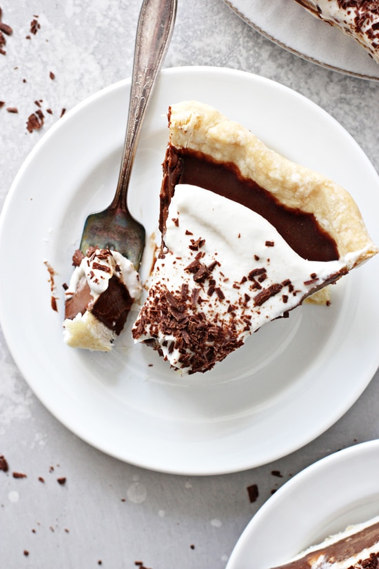 A piece of Dairy Free Chocolate Silk Pie with a bite taken out with a fork.