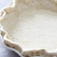 An unbaked Dairy Free Pie Crust in a pie plate.