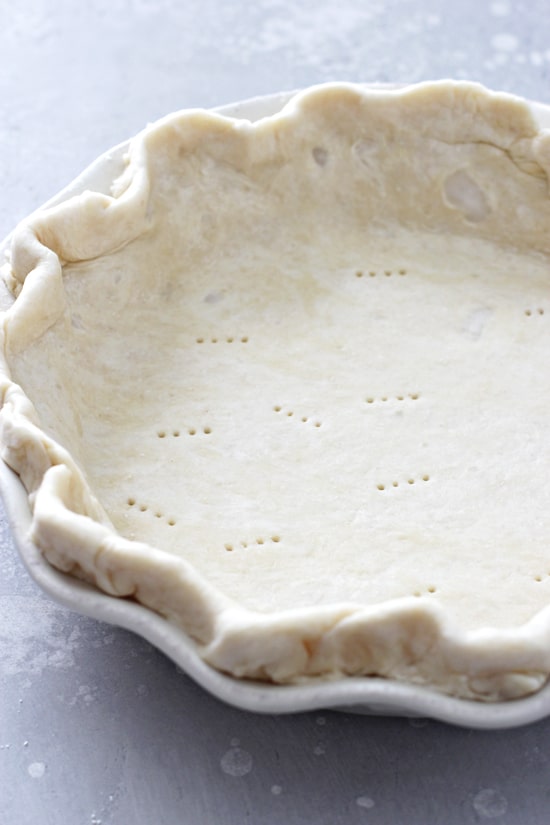 An unbaked Dairy Free Pie Crust in a pie plate.