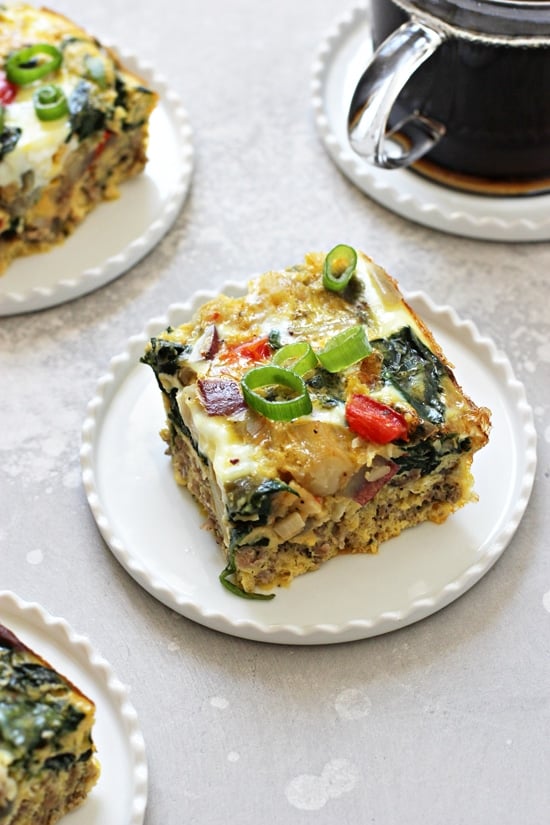 Three pieces of Dairy Free Breakfast Casserole on white plates.