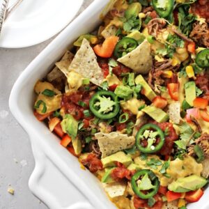 A white baking dish filled with Dairy Free Nachos.