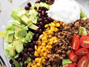 A white plate filled with Dairy Free Taco Salad.