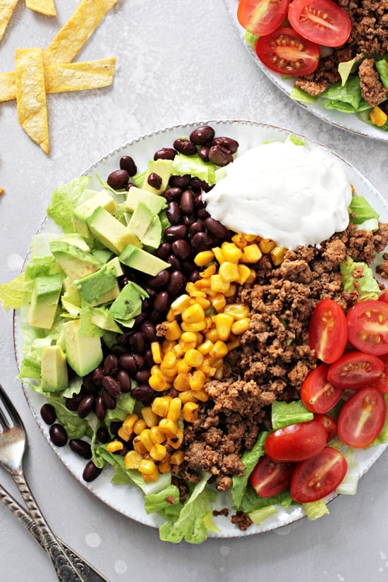 A white plate filled with Dairy Free Taco Salad.