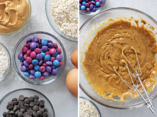 Peanut butter, oats and chocolate candies in small bowls.
