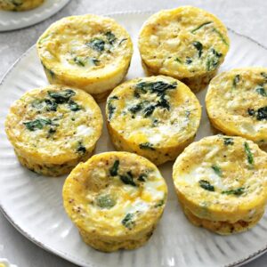 A white plate filled with Dairy Free Egg Muffins.