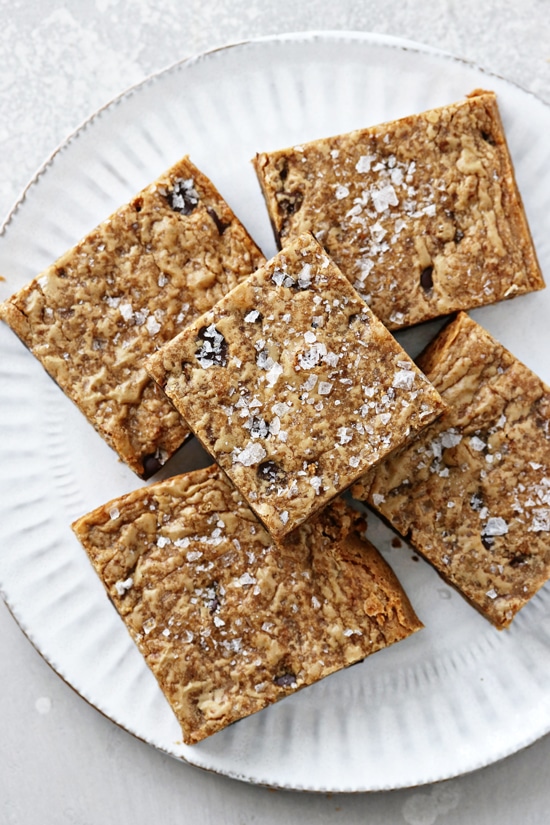 A white plate filled with Coconut Oil Blondies.