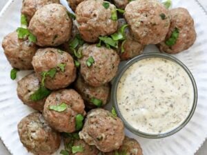 A white plate filled with Dairy Free Turkey Meatballs.