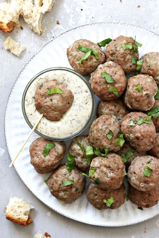Egg Free Turkey Meatballs on a platter with dipping sauce.