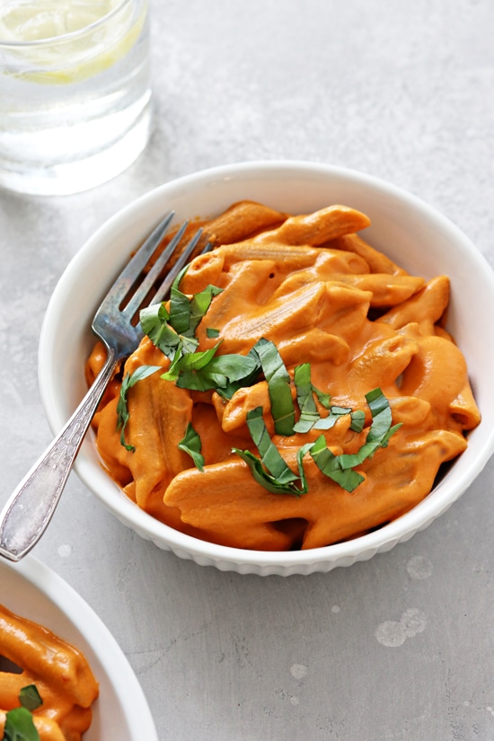 A white bowl filled with Dairy Free Penne alla Vodka.