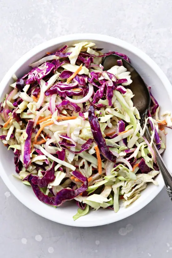 Dairy Free Coleslaw in a white bowl.