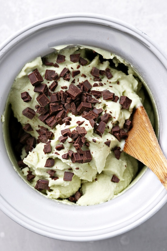 Dairy Free Mint Ice Cream in an ice cream maker bowl.
