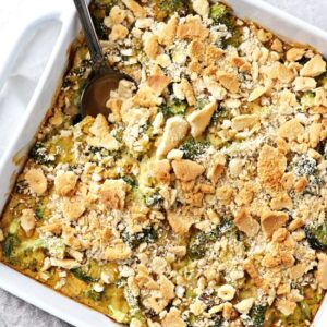 A white baking dish filled with Dairy Free Broccoli Casserole.