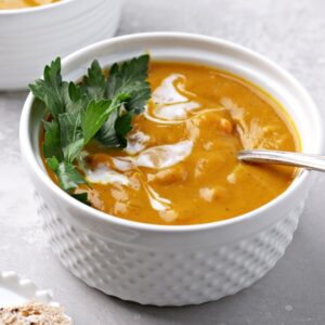 Two bowls of Dairy Free Pumpkin Soup.