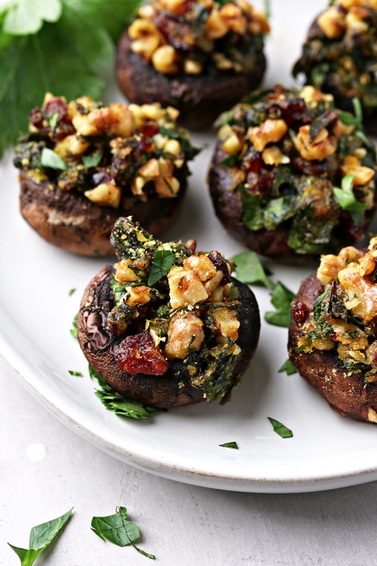 A plate filled with Non Dairy Stuffed Mushrooms.