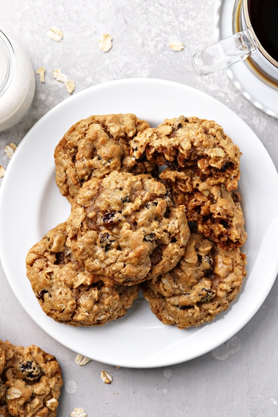 A plate filled with Butter Free Oatmeal Raisin Cookies.