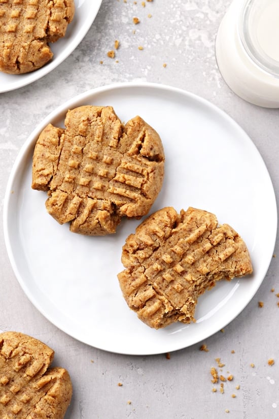 Two Dairy Free Peanut Butter Cookies on a white plate.