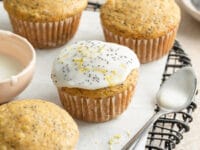 Dairy Free Lemon Poppy Seed Muffins on a wire cooling rack.