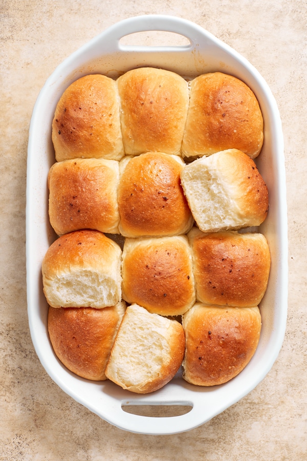 Dairy Free Yeast Rolls in a white baking dish.